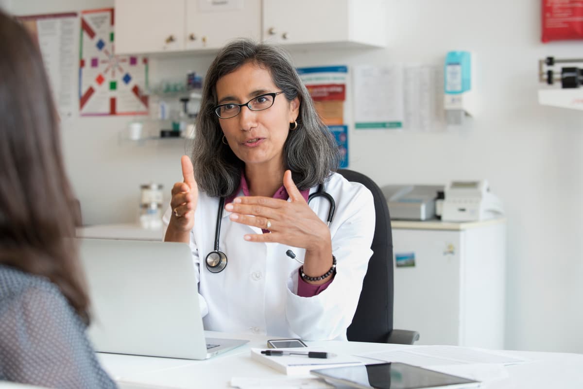 Doctor talking to patient.