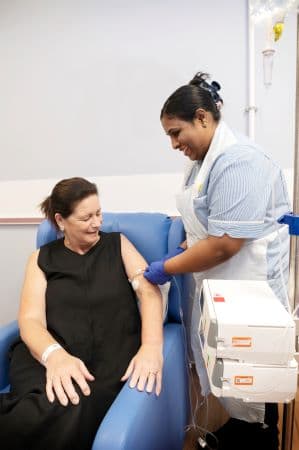 Photograph of a nurse wearing protective equipment.